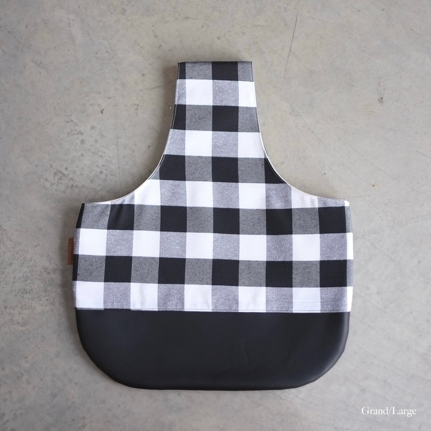 Large project bag in black and white with a black leather bottom for knitting or crochet